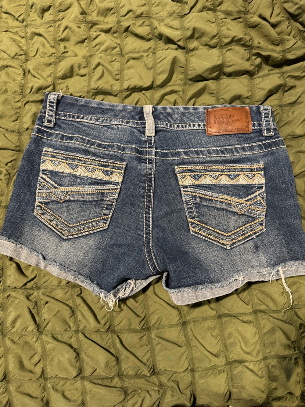 Ariya Distressed Blue Denim Shorts with Embroidered Back Pockets